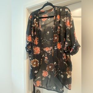 kimono 👘 but I must say, it run small it feels a medium to large